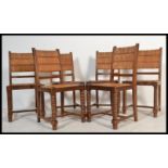 A set of country oak and rattan weave dining chair