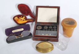 A 19th century cased set of apothecary weights tog