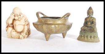 An early 20th Chinese censer ding prayer bowl along with a bronze Buddha and a ivorine resin