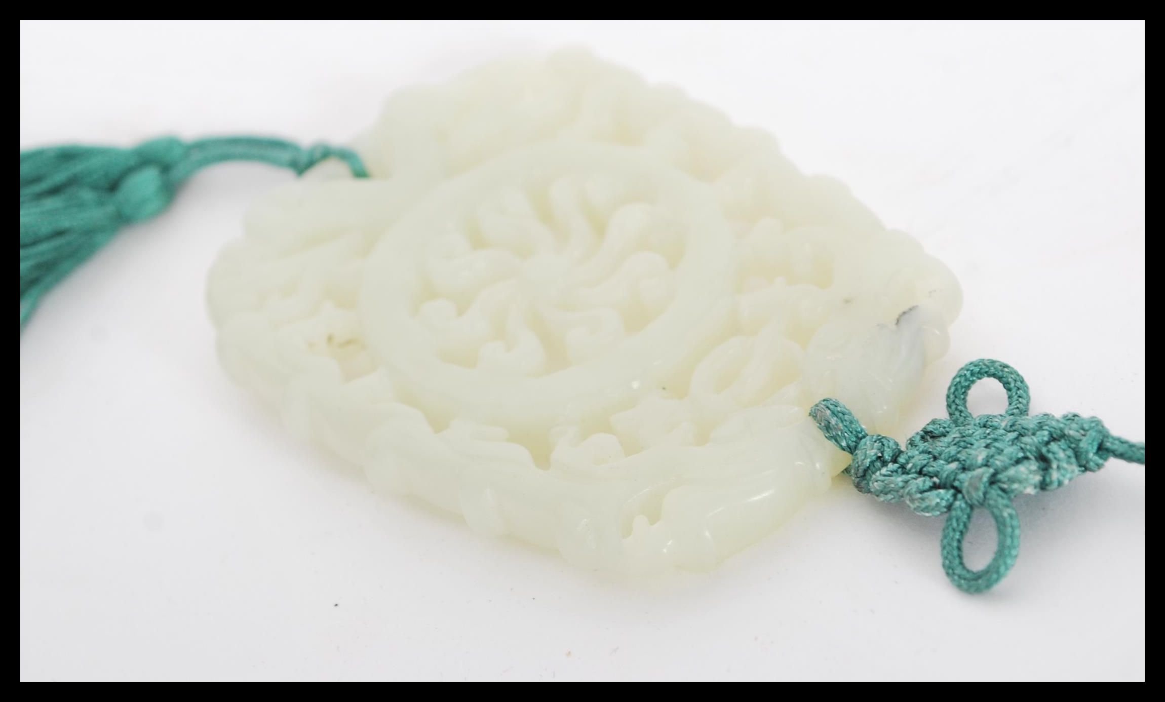 A Chinese carved jade double sided bi pendant havi - Image 5 of 5