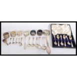 A group of silver hallmarked flatware dating from the early 19th century to include a cased set of