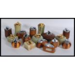 A collection of vintage Ronson table top lighters some in alabaster mounts and the others in