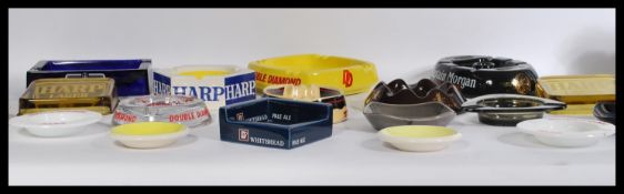 A group of vintage 20th century advertising point of sale pub breweriana ashtrays to include