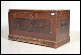 A 19th century pine blanket box coach line coffer chest having a painted scrumble finish. Campaign