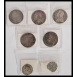 A group of silver English coins dating from the 17