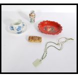 A dealers lot of Chinese items to include a 19th century Kangxi period tea cup and saucer, a