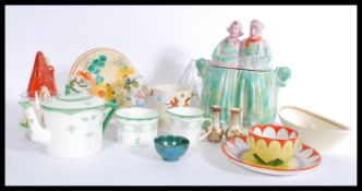 A group of vintage ceramics to include Foley peacock pattern , pair of spill vases , Carlton ware