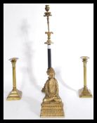 A collection of brass wares to include a well cast