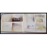 Two albums of antique photographs dating from the