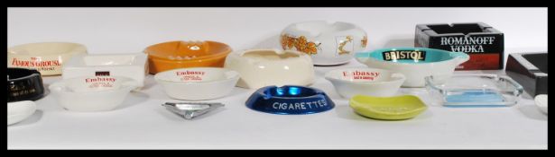 A group of vintage 20th century advertising point of sale pub breweriana ashtrays to include Capstan