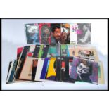 A very large collection of long play LP vinyl record albums featuring many different artists and