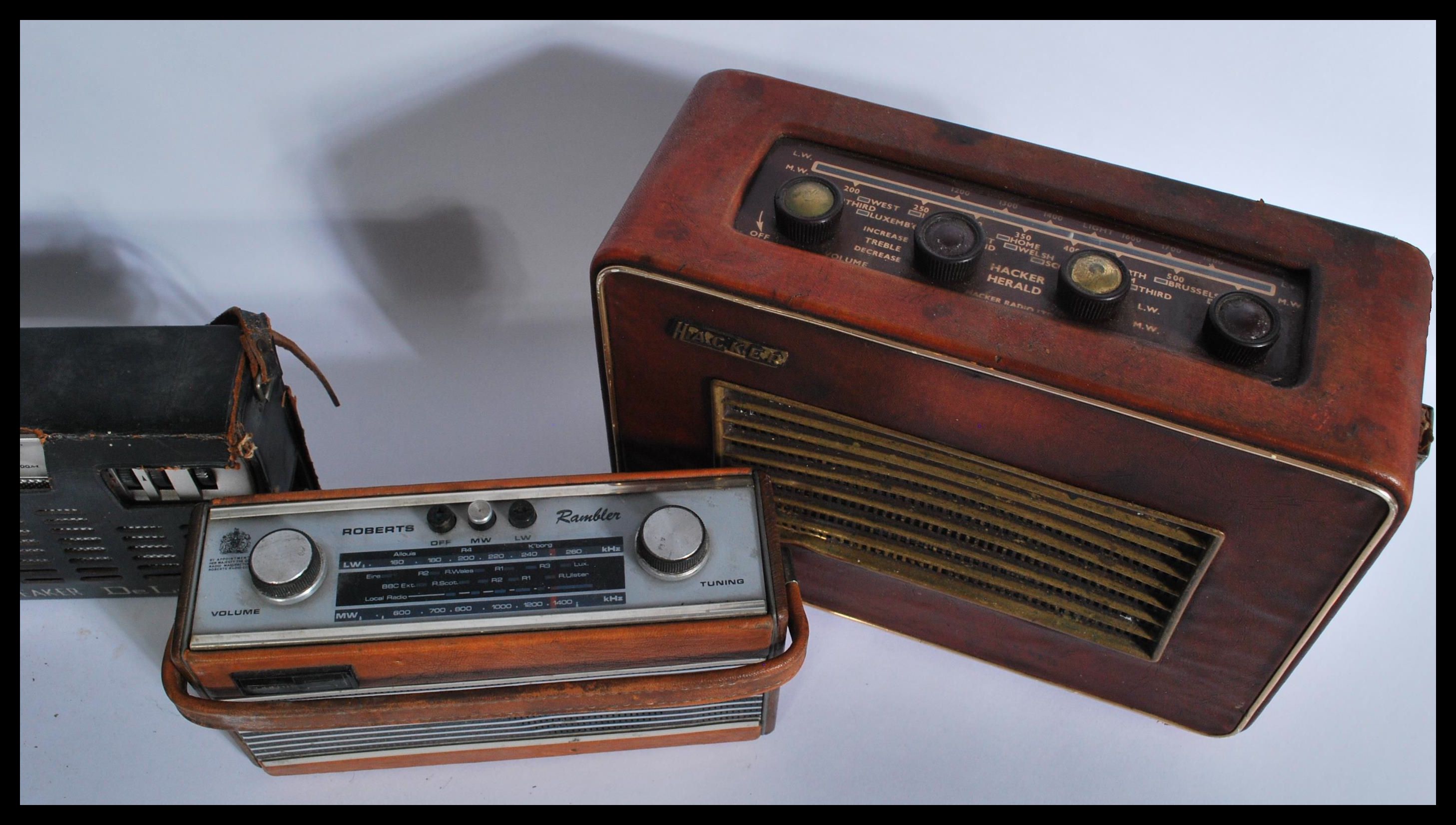 A group of vintage radios to include two Hacker Heralds , Roberts Rambler , ITT Tiny Super , De Luxe - Image 3 of 6