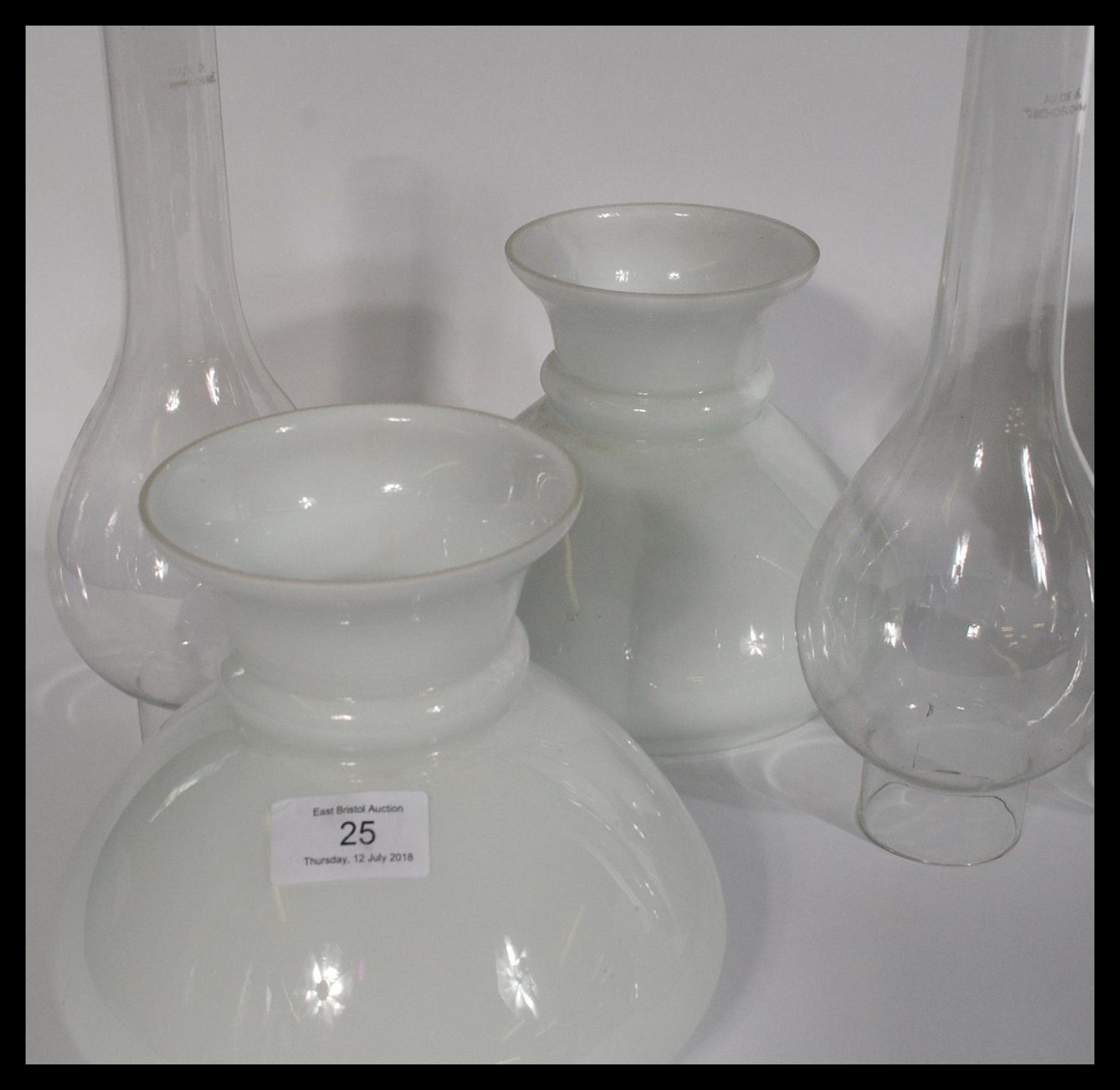 A set of four vintage oil lamp shades and flumes o - Image 4 of 7