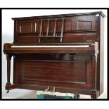 A vintage 20th century mahogany and iron cased upr