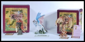 A group of three boxed Enchantica dragons to inclu