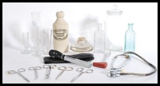 A collection of pre war and post war vintage  glass apothecary / pharmacy and medical items to