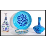 A collection of four Persian / Islamic glazed pott