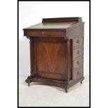 A Victorian style mahogany davenport writing desk.