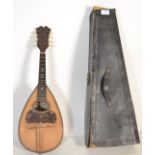 Musical Instruments. A vintage cased Italian mandolin bearing label for Domenico Banoni,