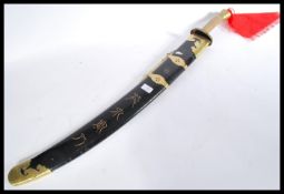 A 20th century Chinese large sword having a lacque