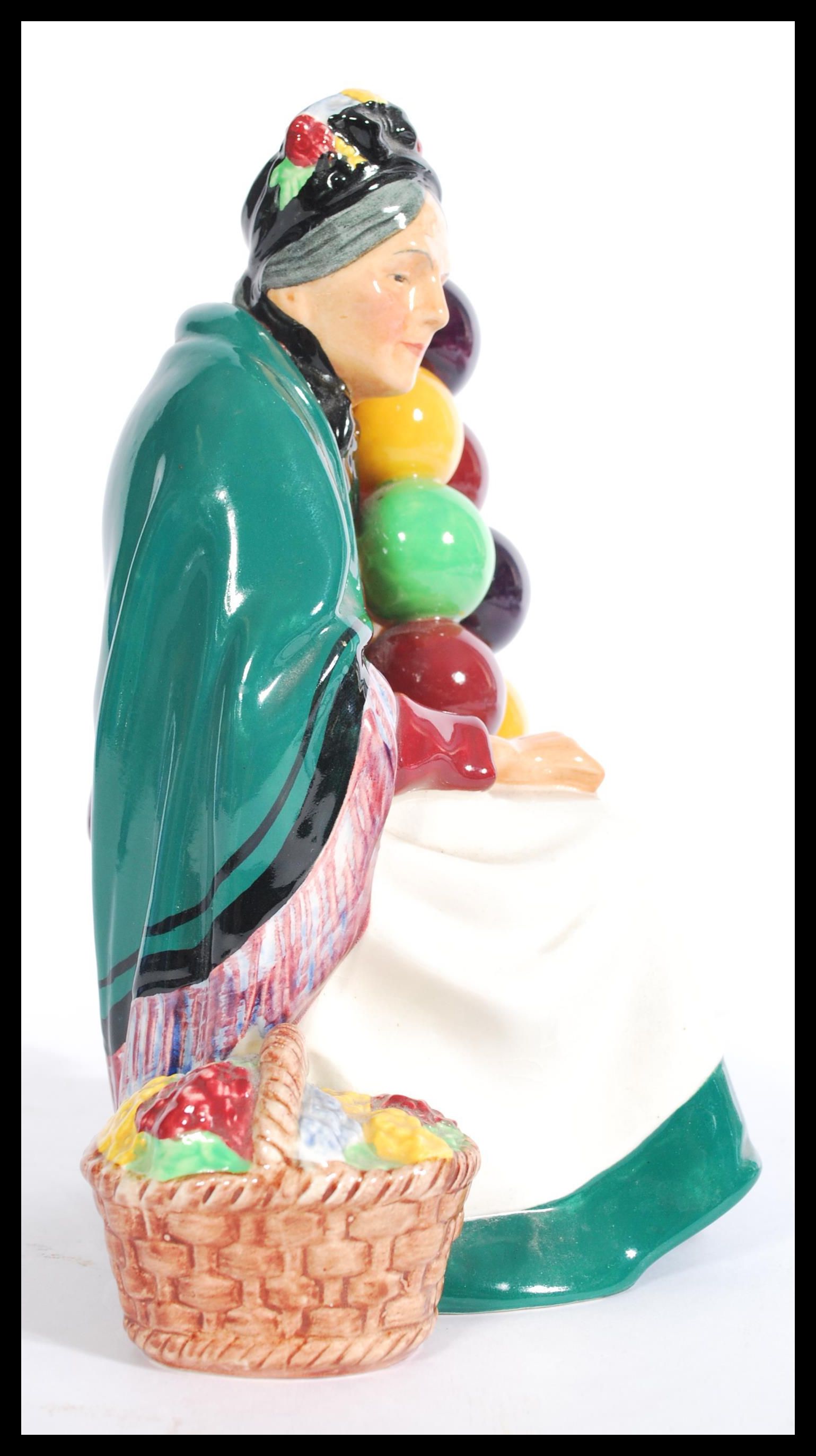 A vintage 20th century Royal Doulton ' The Old Balloon Seller ' HN1315 ceramic figurine, 20cm high - Image 2 of 6