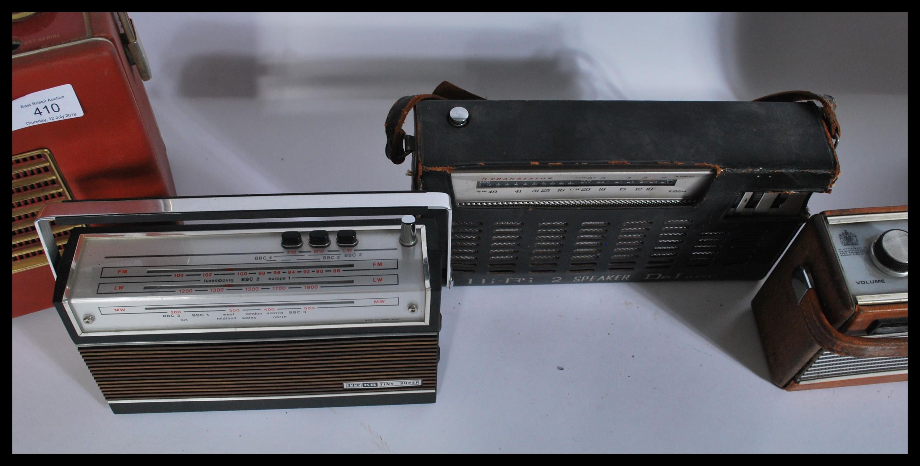 A group of vintage radios to include two Hacker Heralds , Roberts Rambler , ITT Tiny Super , De Luxe - Image 4 of 6