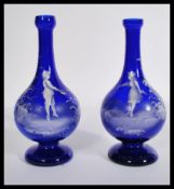 A 19th century Victorian pair of blue glass vases