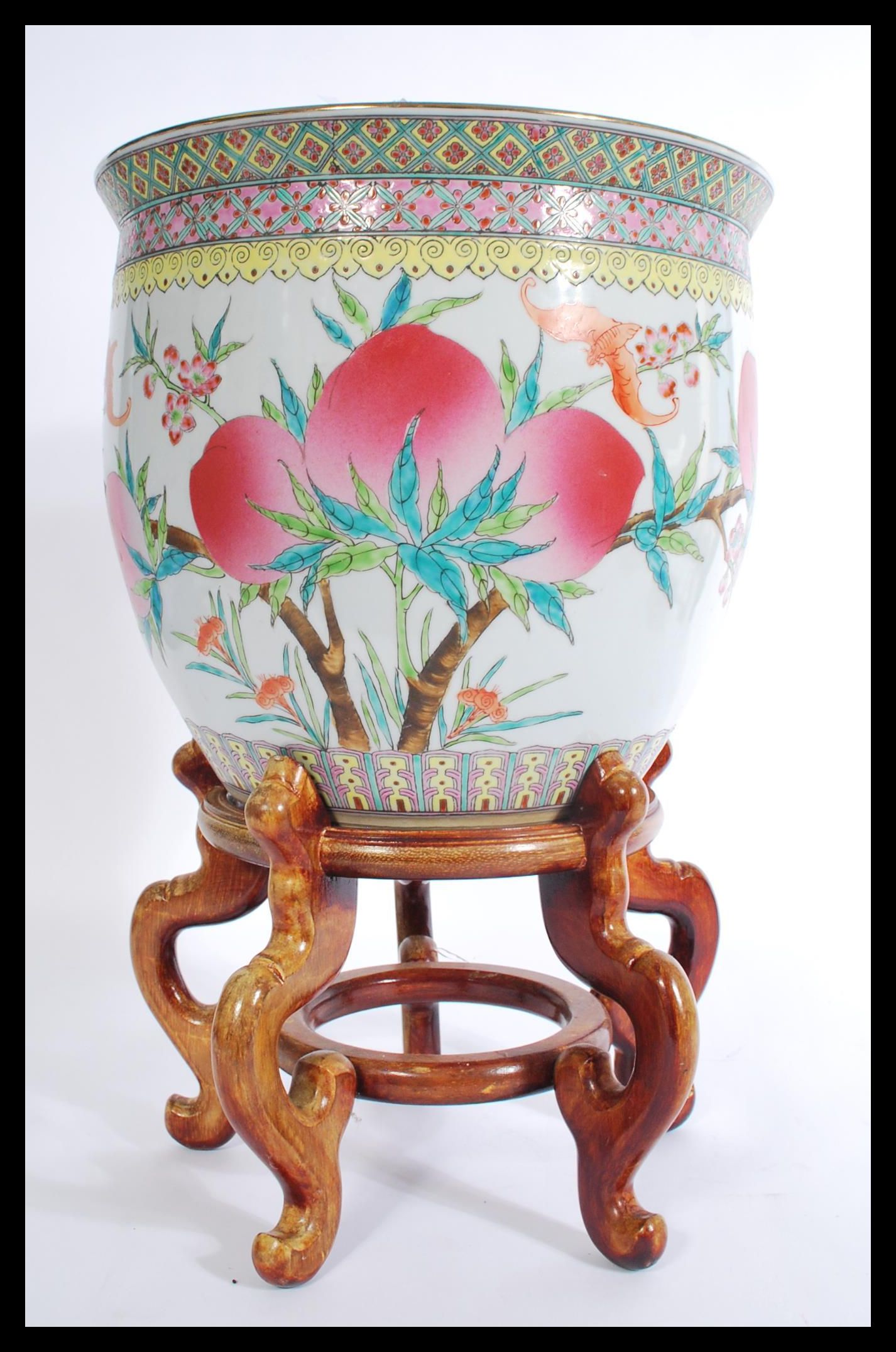 A 20th century large Chinese ceramic planter jardiniere, decorated with peaches and bats of