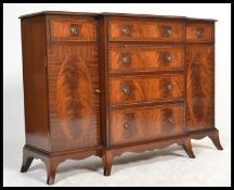 A good Georgian revival mahogany breakfront sideboard dresser.  Raised on French kick legs with a