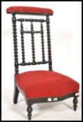 A 19th Century French ebonised and upholstered bob