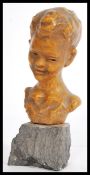 A 20th century continental bust of a young girl by