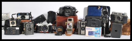 A collection of vintage cameras to include 35mm, b