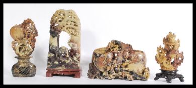 A group of four early 20th century finely carved C