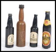 A group of four vintage advertising point of sell