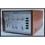 A retro 20th century  teak cased Sony 4 / Quadraph