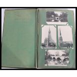 A good early 20th century vintage postcard album c