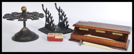 A group of vintage desk / postal office items to include cast metal ebonised pen rest and matching