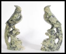 A pair of early 20th century Chinese carved figuri