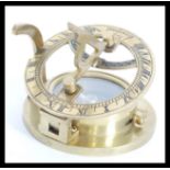 A vintage style nautical brass compass sundial compendium signed J Sewill Liverpool. The compass