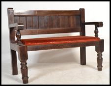 A 20th century pine bench / settle of planked form