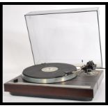 A retro 20th Century stunning Thorens TD 321 suspended chassis turntable. When closed measures 15.