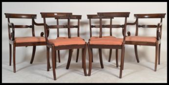 A set of 6 Regency mahogany var back dining chairs to include the 2 carver armchairs. Raised on