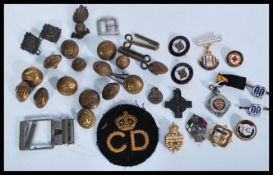 A collection of Military buttons, cap badges, Civi
