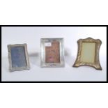 Three silver picture frames to include a 20th cent