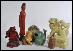 A group of Chinese items to include a Cinnabar lacquer type Buddha , temple lions , carp fish ,