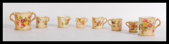 A group of eight Royal Worcester ivory blush minia