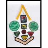 A collection of vintage scout badges - patches to