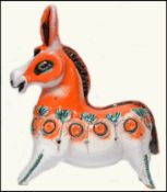 A vintage mid 20th century Italian studio pottery donkey in the manner of Aldo Londi Bitossi.