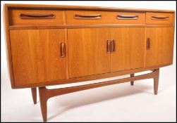 G-Plan - Fresco - A 1970's teak wood sideboard raised on shaped tapering legs having series of short