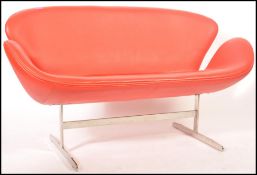 After Arne Jacobsen - Swan sofa - A Fritz Hansen style 20th Century red leather shaped and padded